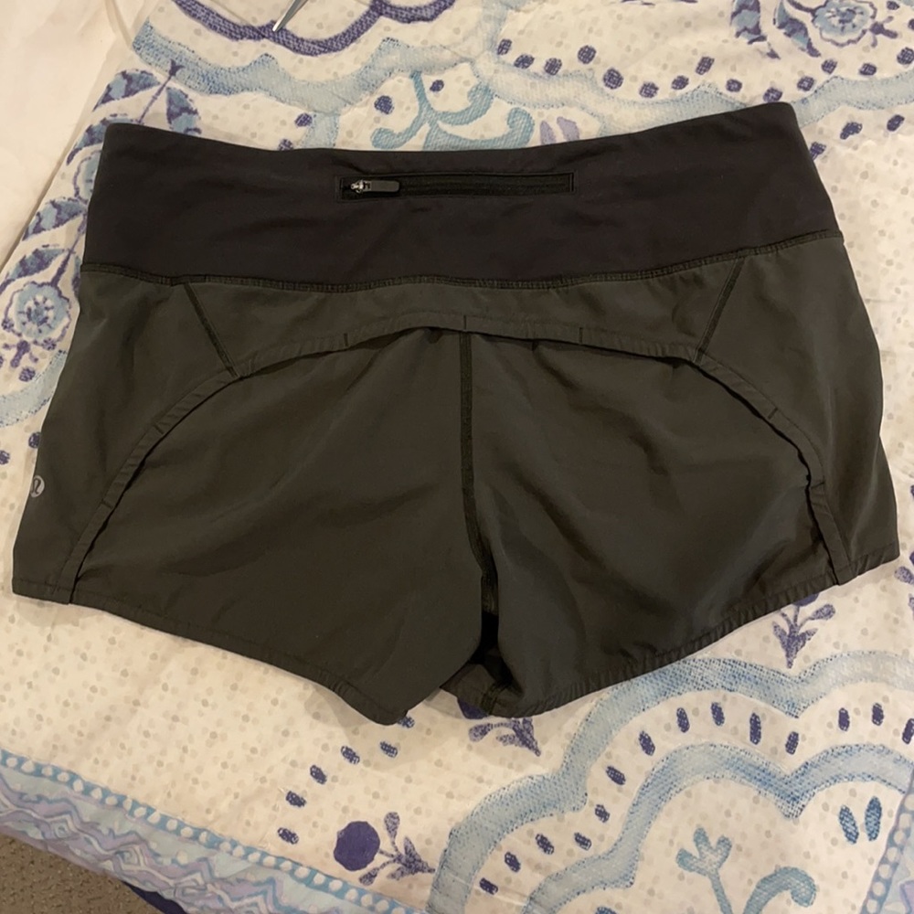 Dark green lululemon speed shorts